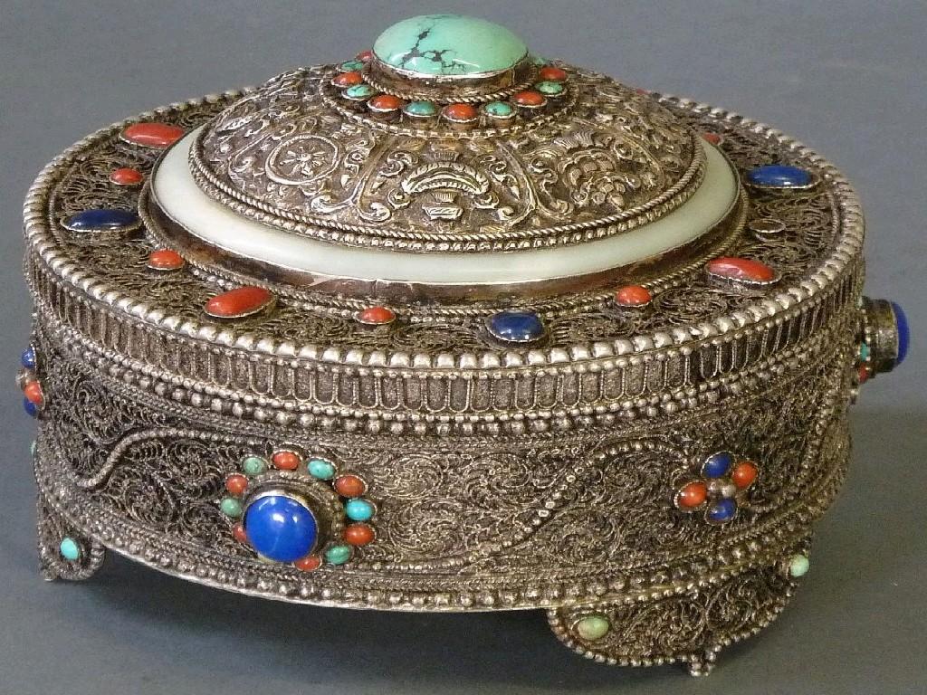 Appraisal: PERSIAN SILVER COLOURED CIRCULAR DOUBLE LIDDED CIRCULAR BOX the loose