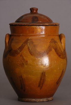 Appraisal: AMERICAN REDWARE POTTERY BEAN POT AND COVER The ovoid bowl