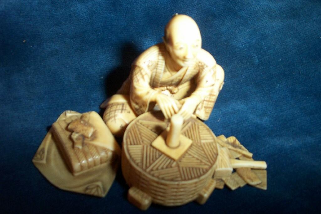 Appraisal: A good quality th century Japanese carved ivory figure of