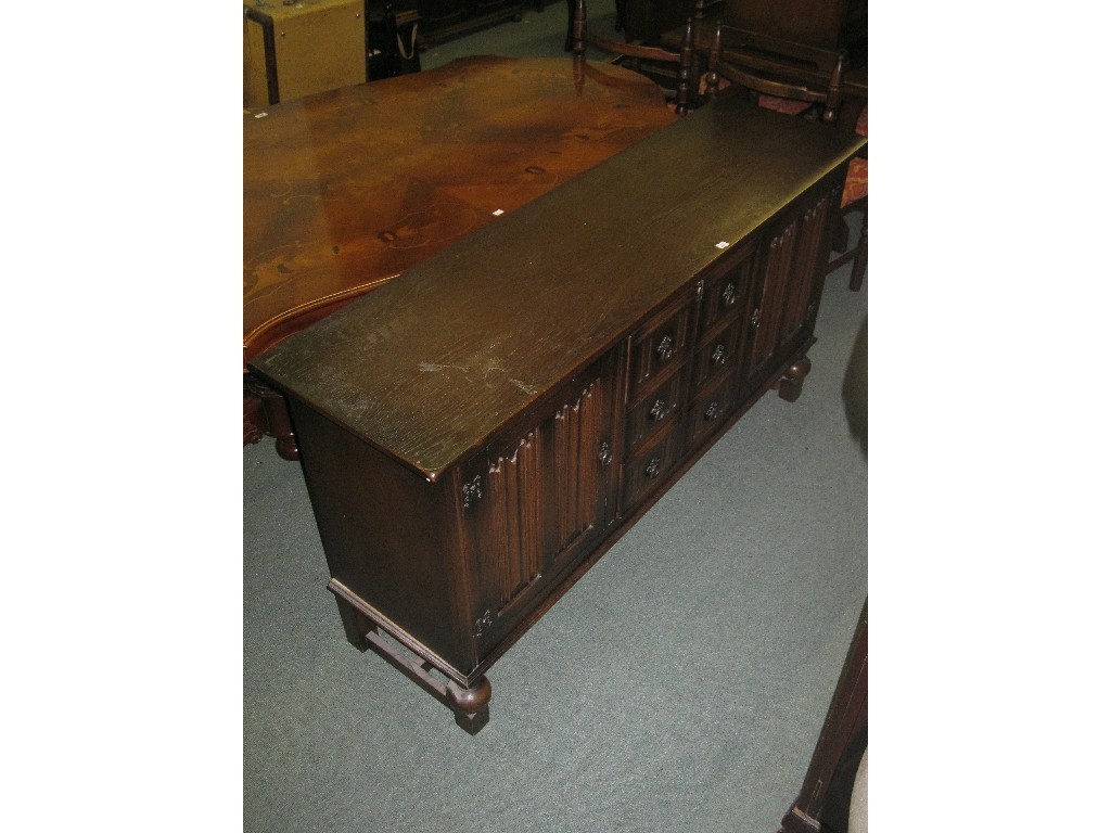 Appraisal: Oak linenfold panelled sideboard