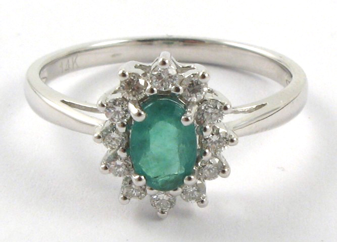 Appraisal: EMERALD DIAMOND AND WHITE GOLD RING The k white gold