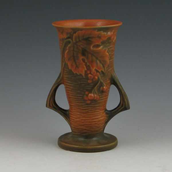 Appraisal: Roseville Bushberry handled vase in brown Marked Roseville USA -