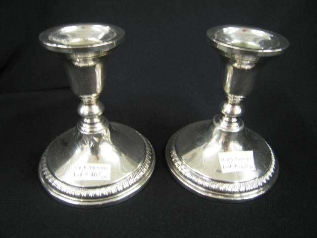 Appraisal: Pair of Sterling Silver Candleholders gadroon borders weighted