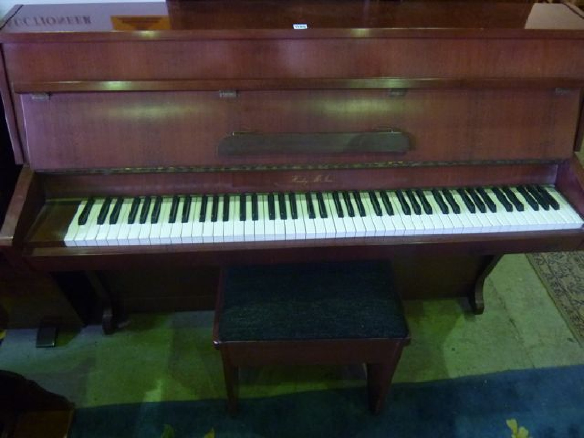 Appraisal: A Harley McLvar upright modern ironframed overstrung piano with polished