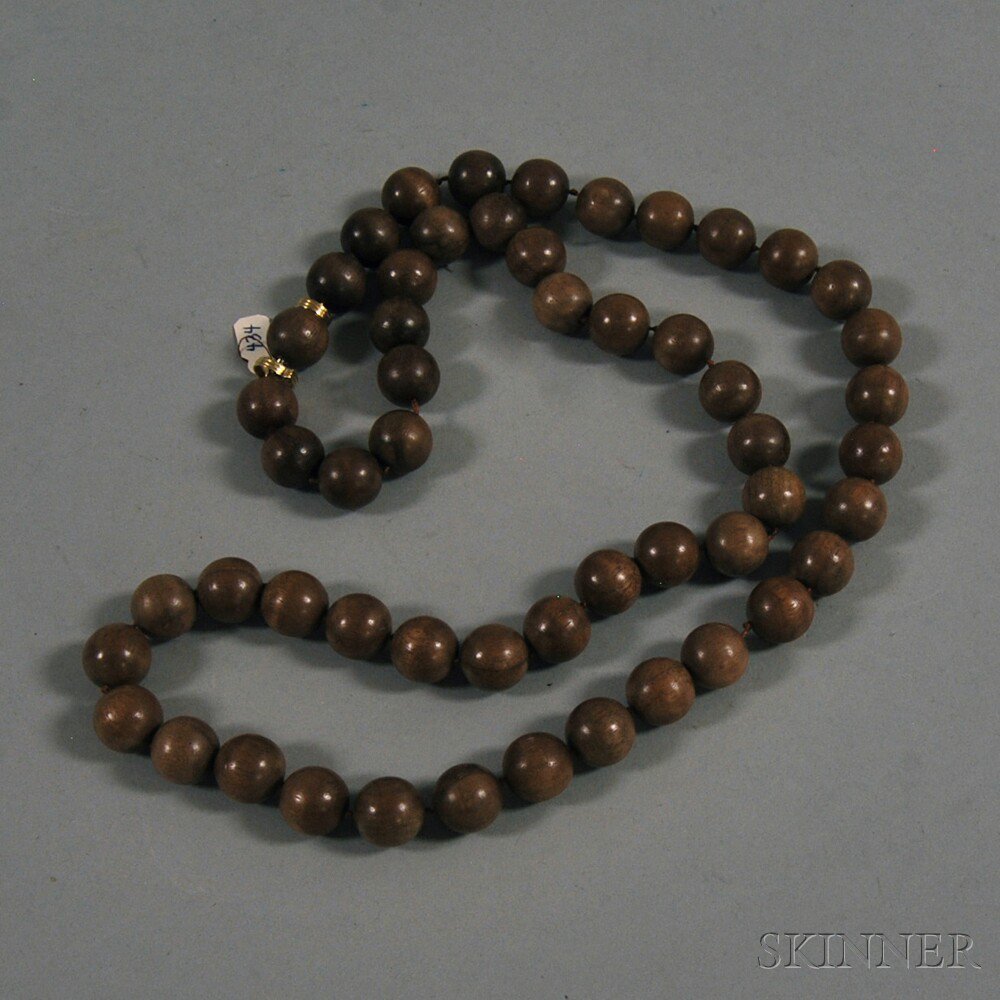 Appraisal: Trianon Wooden Bead Necklace completed with kt gold clasp beads