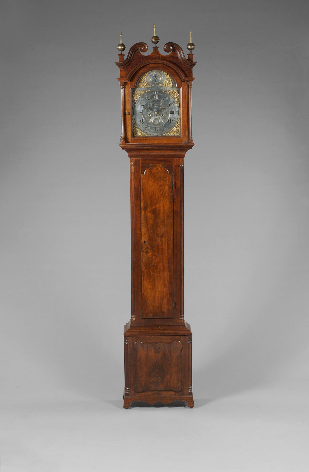 Appraisal: PENNSYLVANIA CHIPPENDALE CARVED WALNUT TALL-CASE CLOCK The bonnet with molded