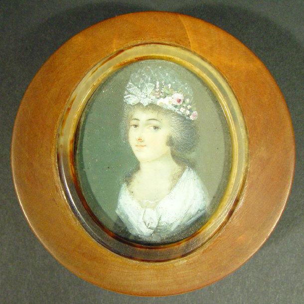 Appraisal: th century oval portrait miniature onto ivory of a young