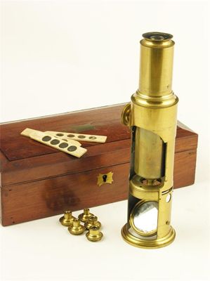 Appraisal: A th century brass monocular microscope in cm h with