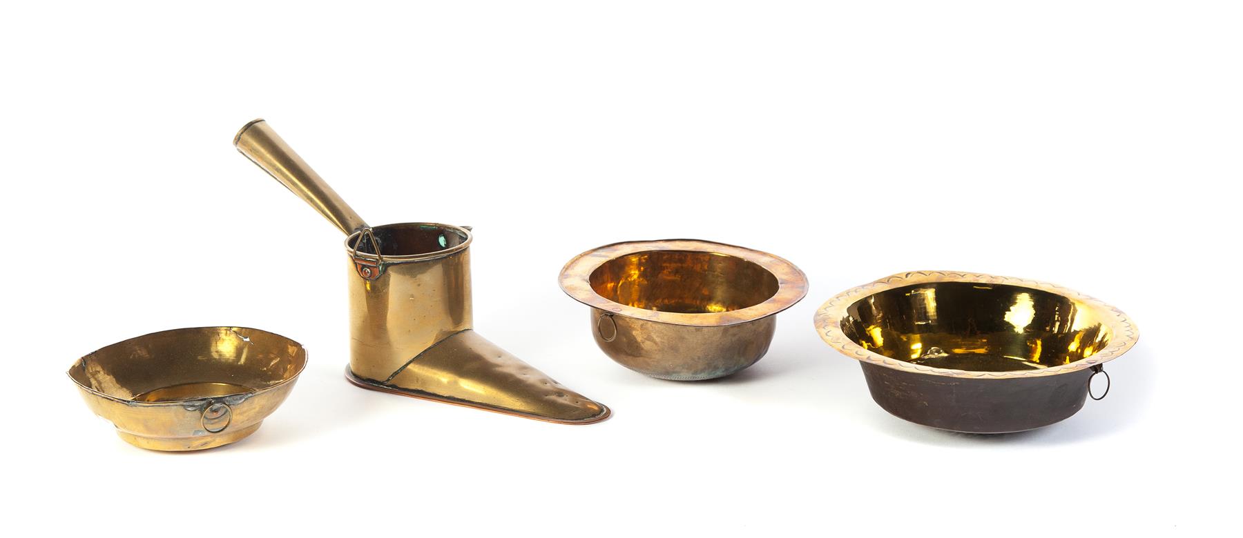 Appraisal: THREE BRASS COLANDERS AND AN ALE BOOT Nineteenth century Colanders