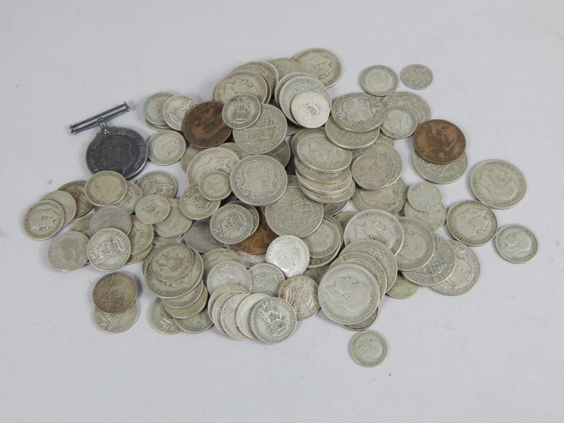 Appraisal: A quantity of coins to include George V silver half