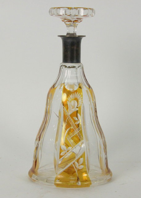 Appraisal: A Bohemian glass bell shaped decanter and stopper etched amber