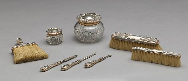 Appraisal: A partial set of lady's sterling mounted dressing table itemsWallace