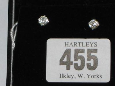 Appraisal: A PAIR OF DIAMOND STUD EARRINGS claw set in ct