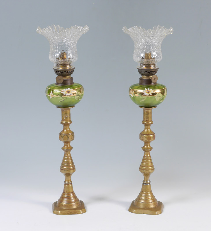 Appraisal: PAIR BEEHIVE BRASS PEG FONT OIL LAMPS Beehive brass bases