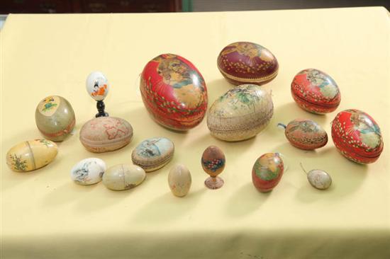 Appraisal: SEVENTEEN EGGS Eleven paper mache with lithograph decoration Smallest h