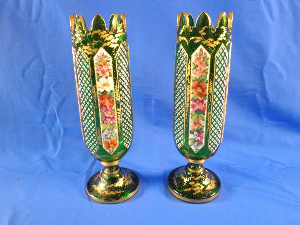 Appraisal: A pair of Bohemian green and white overlay vases each