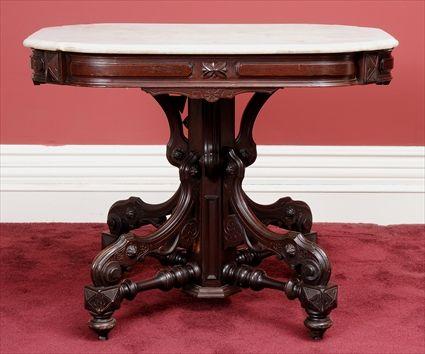 Appraisal: AMERICAN RENAISSANCE REVIVAL CARVED AND INCISED ROSEWOOD MARBLE-TOP CENTER TABLE