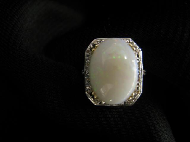 Appraisal: Opal Diamond Ring carat oval cabochon gem surrounded by diamonds