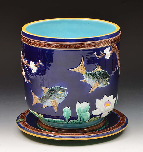 Appraisal: Victorian Majolica jardiniere and standcobalt blue ground with relief decoration