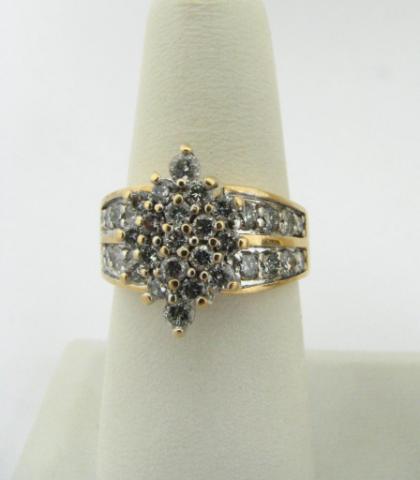 Appraisal: K yellow gold ring with approximately twenty diamond cluster and