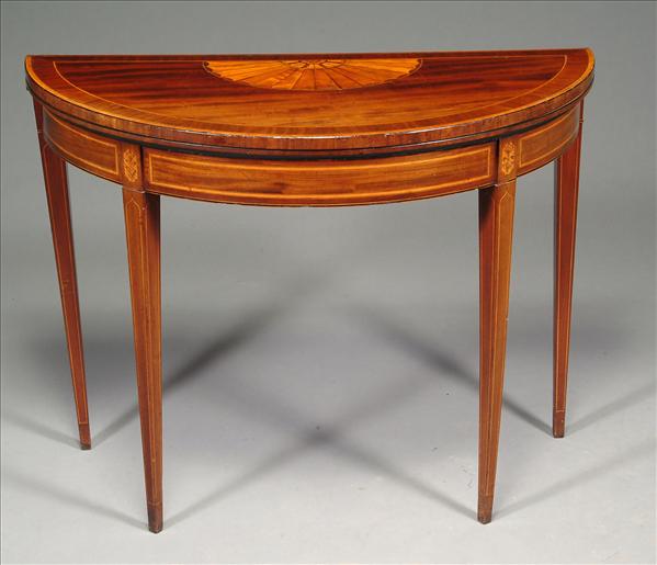 Appraisal: A mahogany marquetry and satinwood crossbanded demi-lune card table in