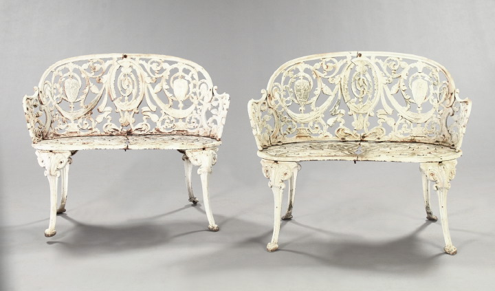 Appraisal: Pair of Diminutive Renaissance Revival-Style Cast-Iron Garden Benches the backs