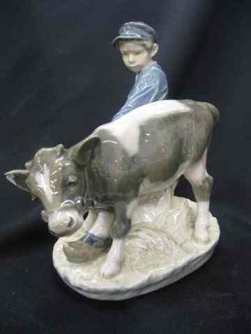 Appraisal: Royal Copenhagen Porcelain Figurine ofbox with cow '' excellent