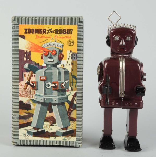 Appraisal: Japanese Battery-Operated Tin Litho Zoomer Robot In original box Box