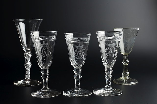 Appraisal: A SET OF THREE GLASS WINES each with a band