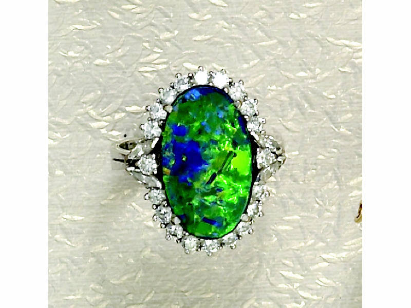 Appraisal: BLACK OPAL DOUBLET AND DIAMOND RING k white gold ring