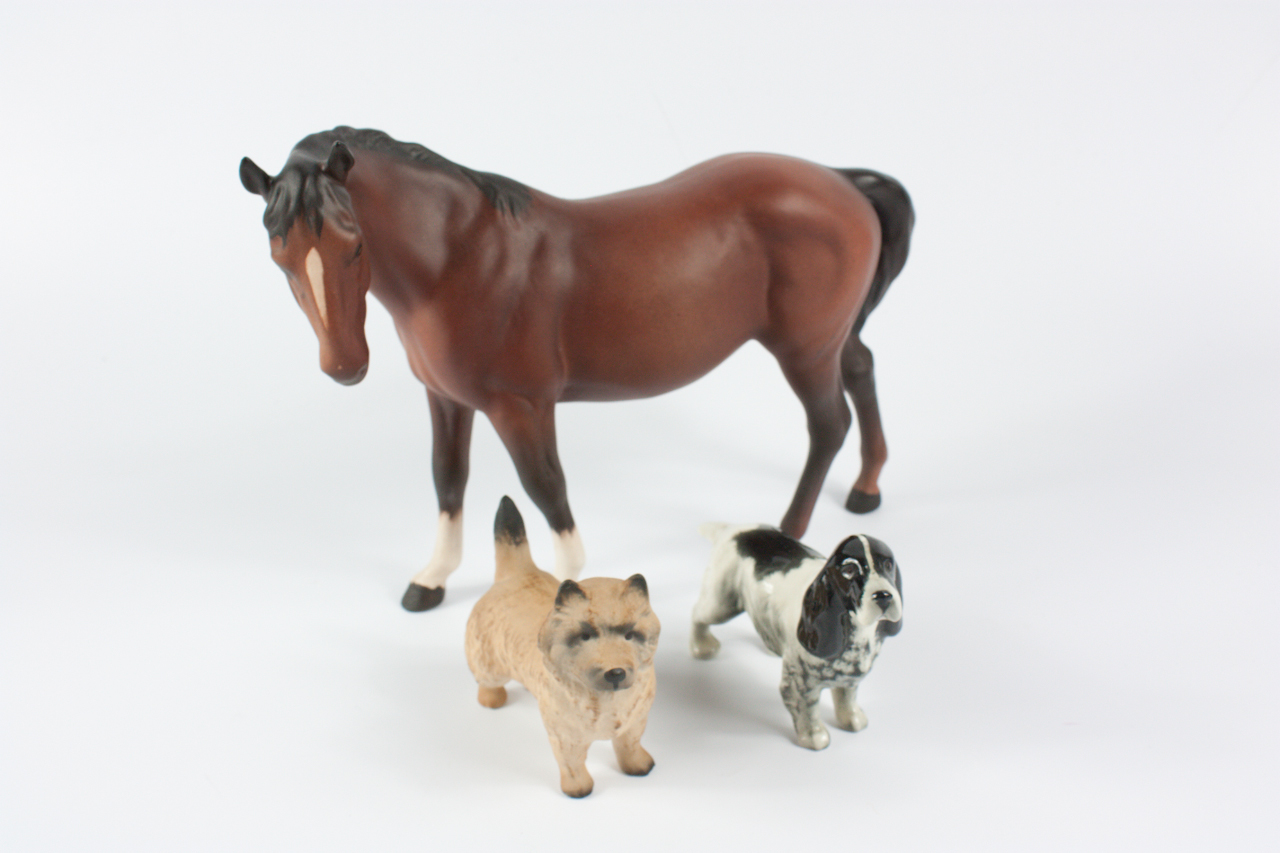 Appraisal: A Beswick matt brown horse together with a spaniel and