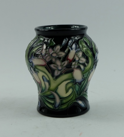 Appraisal: Moorcroft small vase decorated with purple green flowers dated height