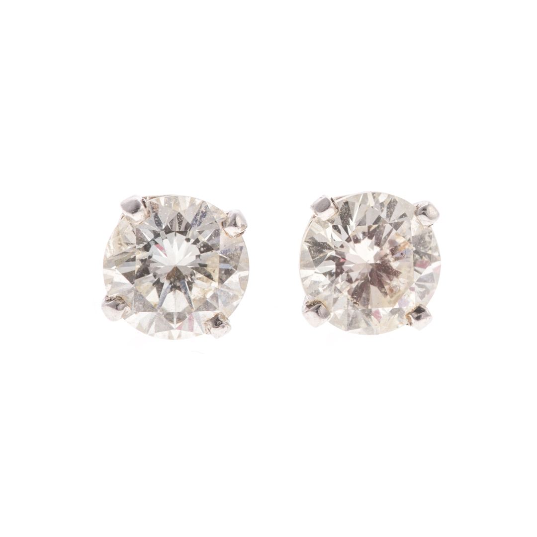 Appraisal: A Pair of Diamond Solitaire Earrings in Platinum Platinum diamond