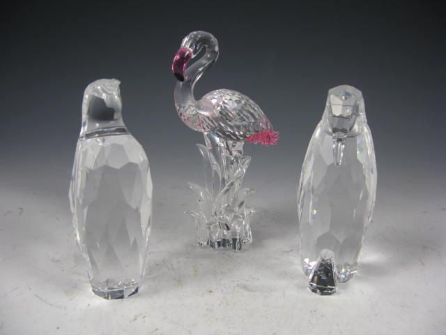 Appraisal: Three Swarovski Crystal Animals two penguins one flamingo in in