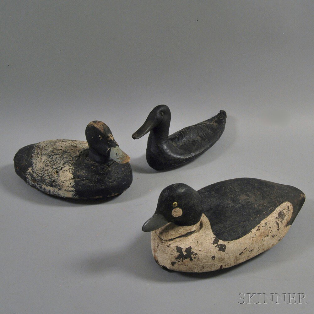 Appraisal: Three Duck Decoys th th century two carved and painted