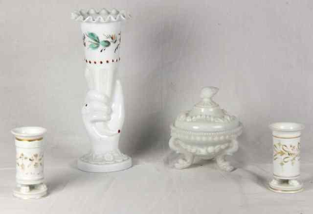 Appraisal: A pair of white porcelain spill vases possibly French decorated