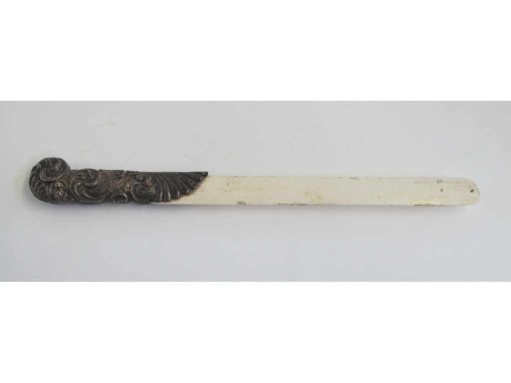 Appraisal: White metal and ivory leaf turner