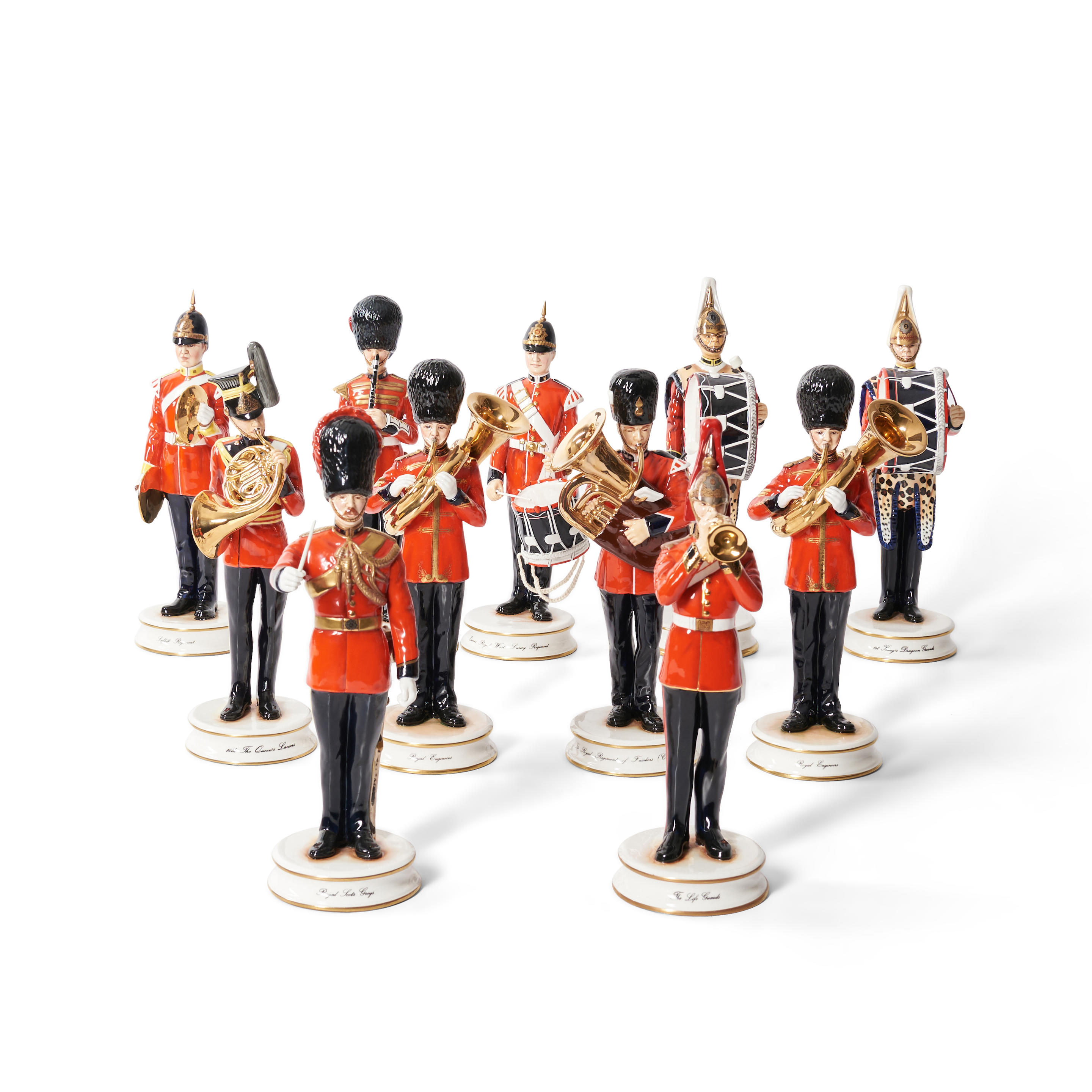 Appraisal: ELEVEN MICHAEL SUTTY BRITISH PORCELAIN MILITARY BAND FIGURINES including two