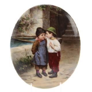 Appraisal: German porcelain plaque of two children German porcelain plaque of