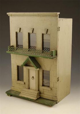 Appraisal: A painted wood dolls house of a two storey balconied