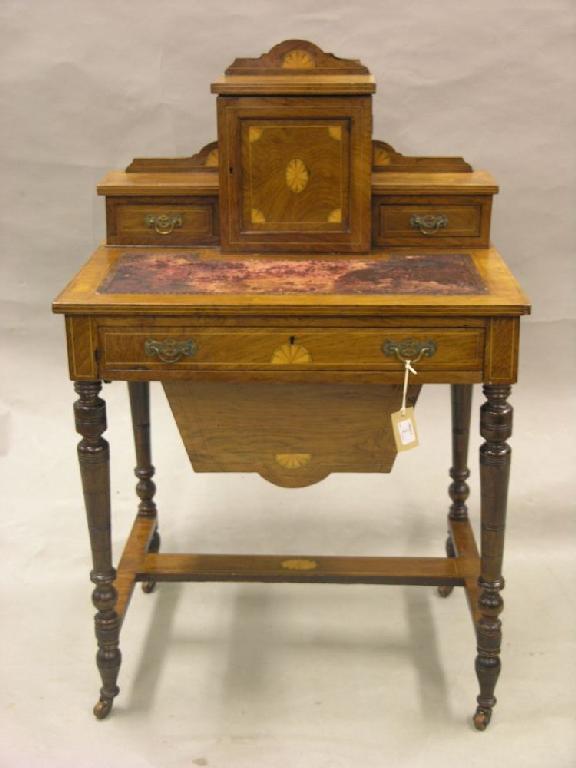 Appraisal: A late Victorian inlaid rosewood writing-work table top with inset