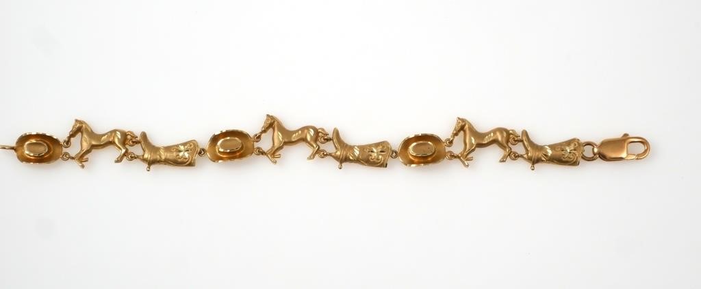 Appraisal: K yellow gold bracelet in a linked cowboy hat to