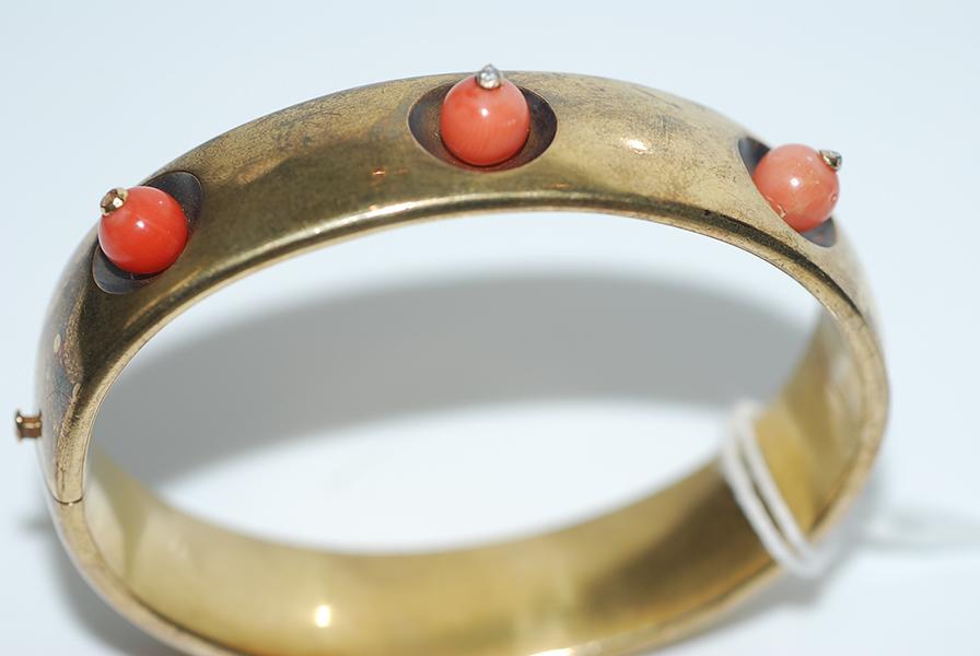 Appraisal: AN ANTIQUE CORAL AND DIAMOND BANGLE IN CT GOLD A