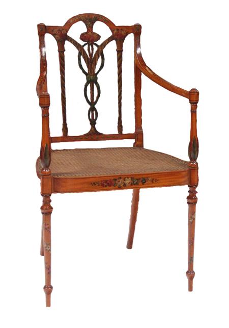 Appraisal: An Edwardian satinwood and painted open armchair the arched back