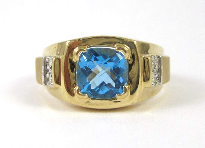 Appraisal: MAN'S BLUE TOPAZ AND DIAMOND RING k gold with two