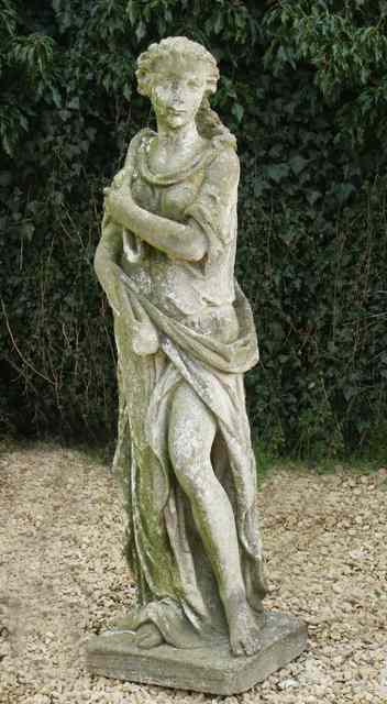 Appraisal: A LATE VICTORIAN WEATHERED COMPOSITION GARDEN STATUE in the form