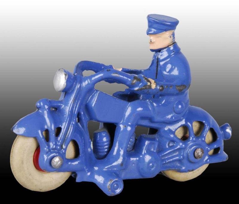 Appraisal: Cast Iron A C Williams Motorcycle Toy Description Policeman rider