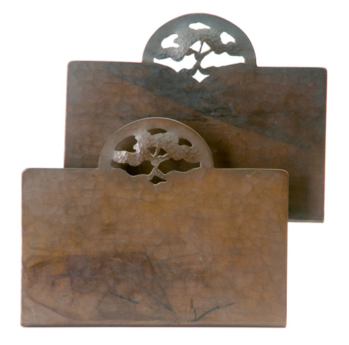 Appraisal: DIRK VAN ERP Hammered copper bookends each with a pierced