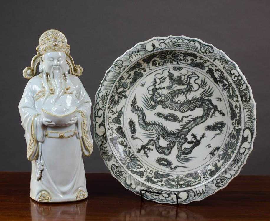 Appraisal: CHINESE PORCELAIN CHARGER AND FIGURE the blue and white charger