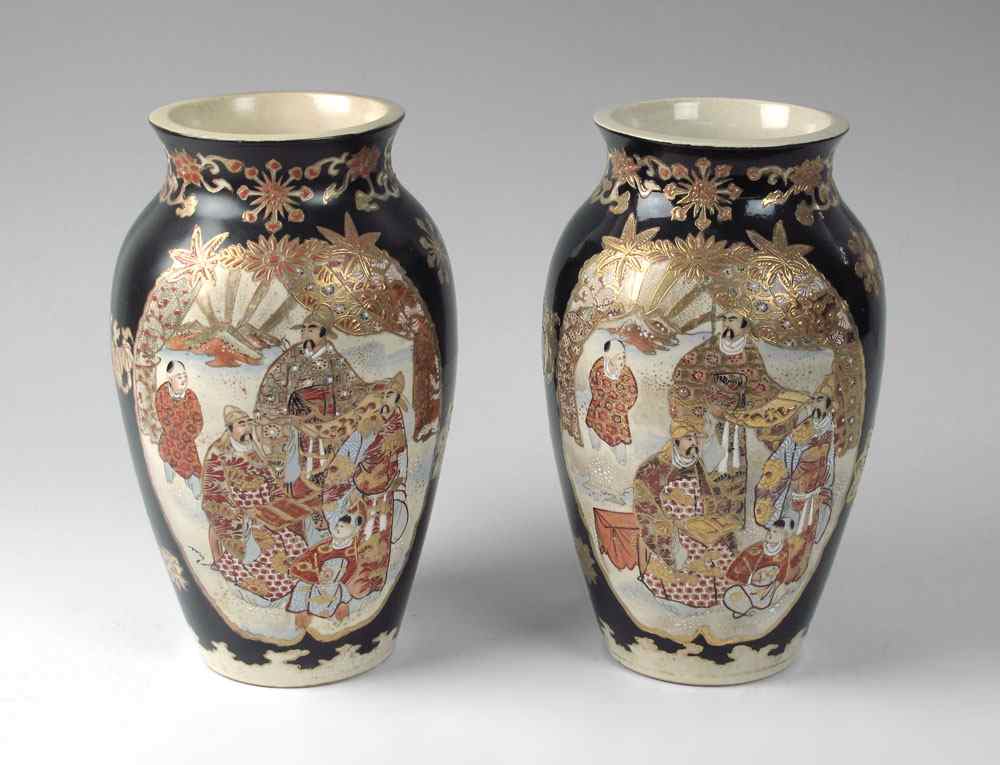 Appraisal: PAIR JAPANESE SATSUMA VASES Black ground with figures in reserve